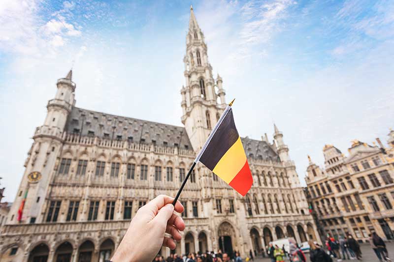 België